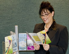 Anna reading a factsheet
