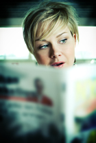 Woman reading newspaper