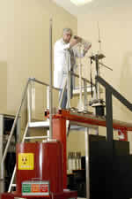 Technician setting up measuring equipment