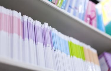 Bookshelf displaying reference material