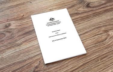 Document placed on a wooden table.