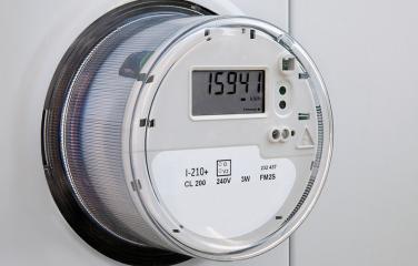 Close up of a residential electric digital smart meter.