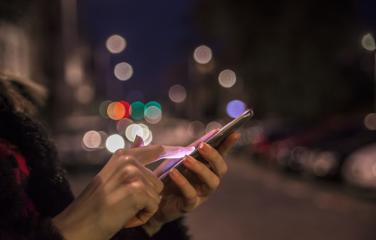 Image of person using their phone