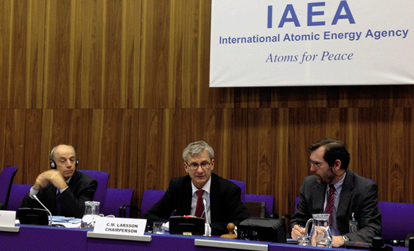Carl-Magnus Larsson and two others address the meeting after IAEA meeting