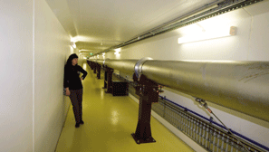 ARPANSA scientist observing delivery of the synchrotron beam to the IMBL measurement room