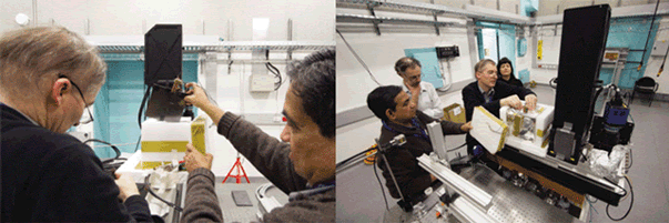 Staff from ARPANSA's Medical Radiation Services Branch at the Australian Synchrotron in Clayton, Melbourne at work positioning the graphite calorimeter inside a polystyrene box for thermal insulation